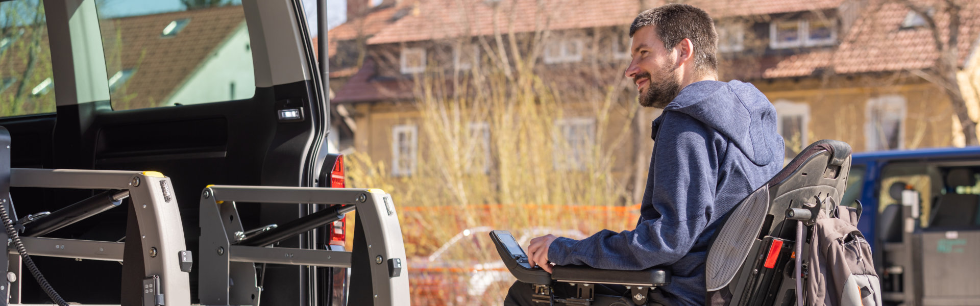 man riding in wheelchair