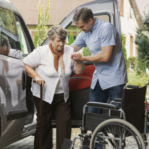 man helping an elderly