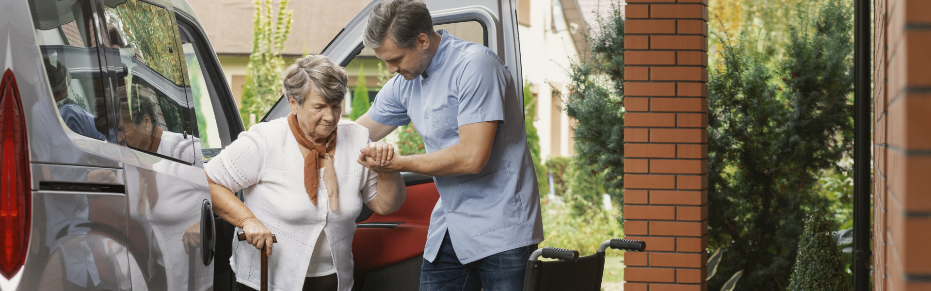 man helping an elderly