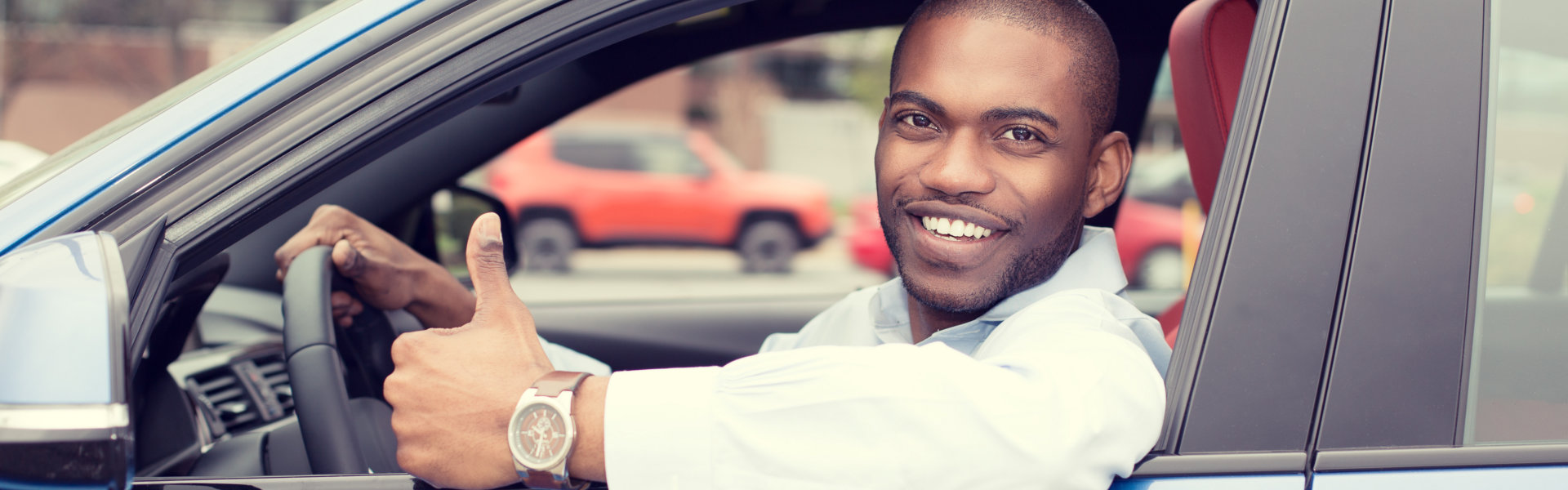 driver showing thumbs up